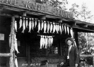 Fre "Dad" Skinner in front of the General Store at Pine Knot lodge.