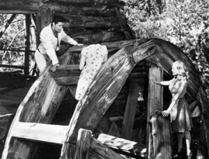 Elvis in Big Bear on the old Cedar Lake mill, singing to his leading ladies on the set of his movie "Kissing Cousins". - Rick Keppler collection.